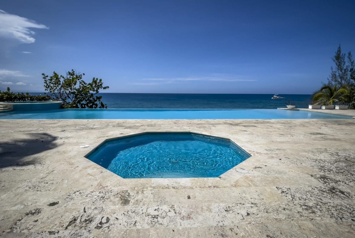 buyDRproperty Ocean view from a luxury 2-bedroom condo with infinity pool Sosua Real Estate