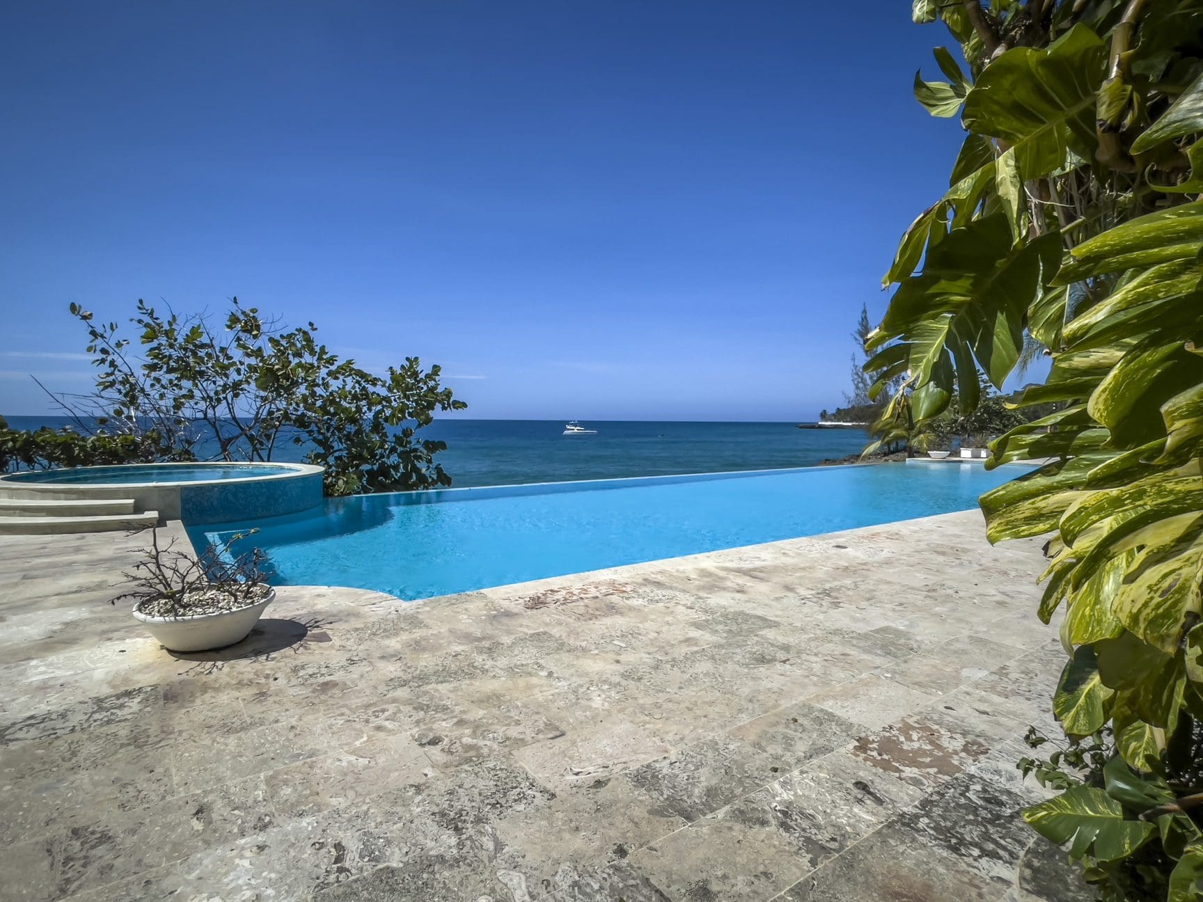 buyDRproperty Infinity pool overlooking the ocean, perfect for a 3 bedroom Pre-Construction For Sale. Sosua Real Estate