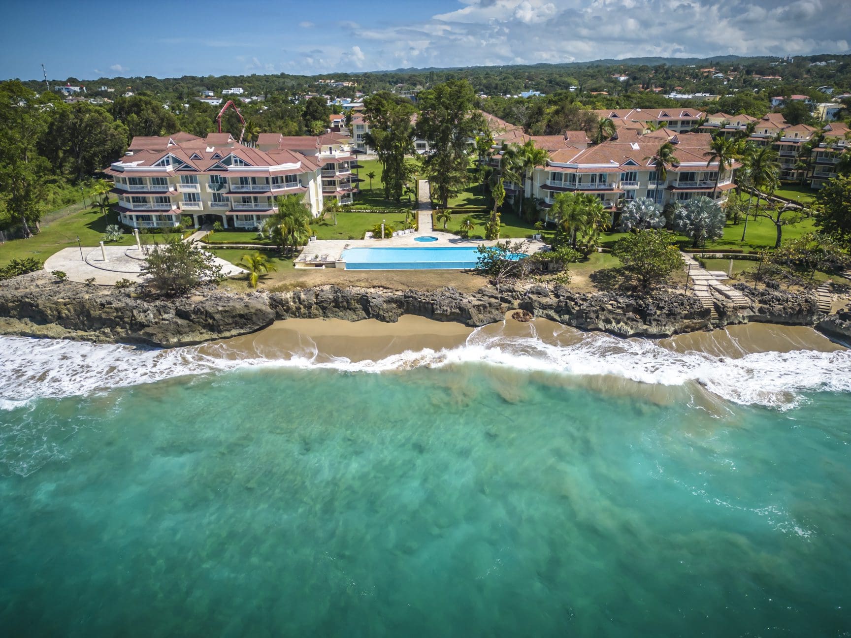 buyDRproperty Luxury beachfront condo with a pool. 3 bedroom Pre-Construction For Sale. Sosua Real Estate