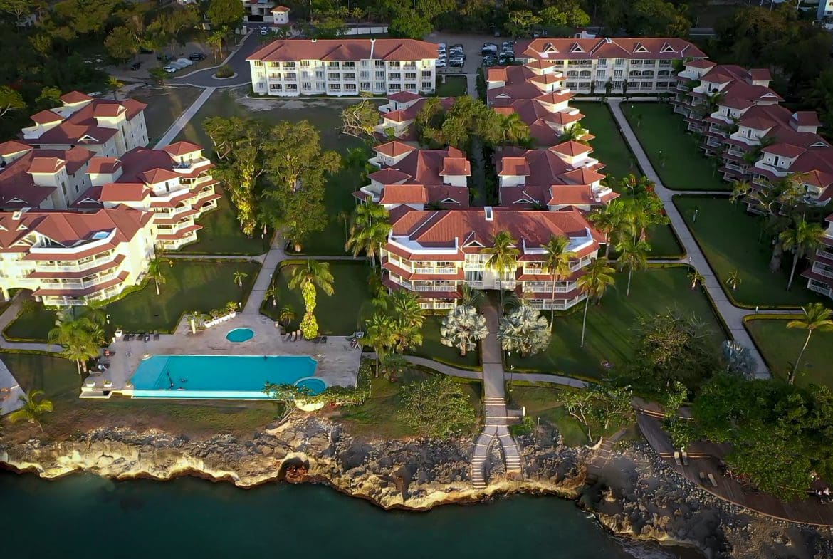 buyDRproperty Aerial view of a luxury resort with a pool, near the ocean. 3 bedroom Pre-Construction For Sale. Sosua Real Estate