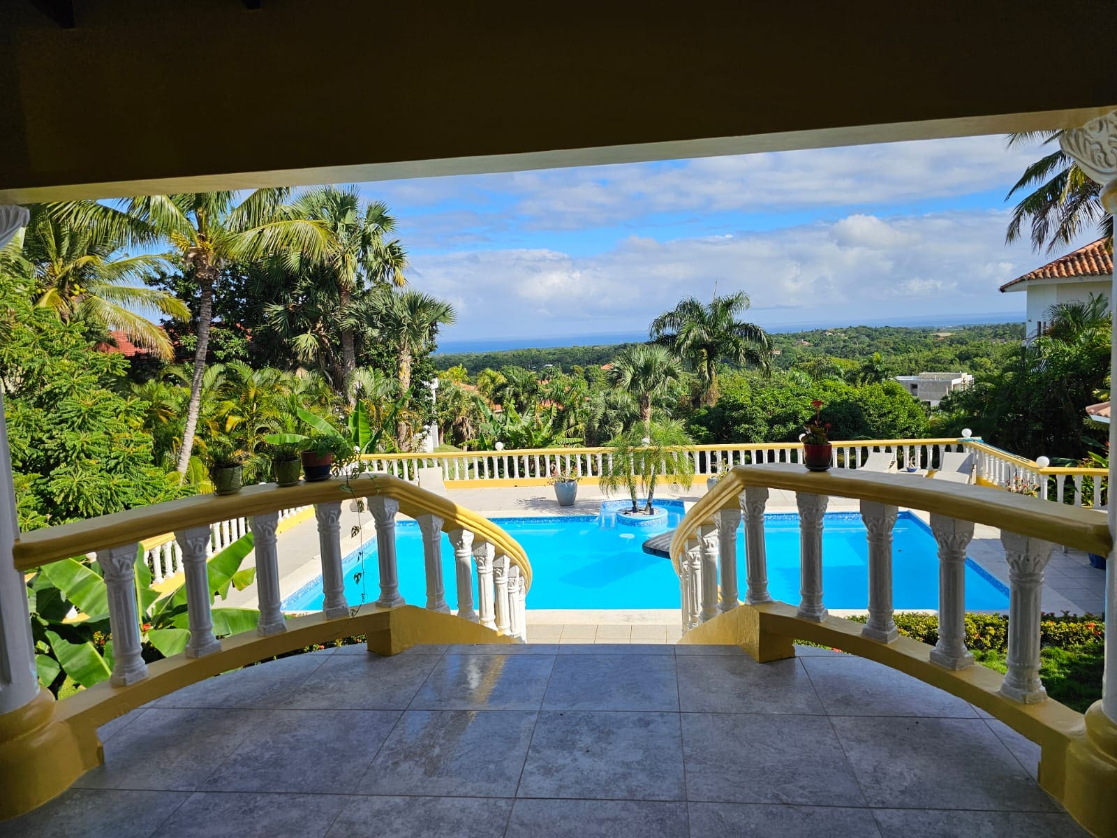 buyDRproperty Ocean views from a luxury villa overlooking a pool in Panorama Village. Sosua Real Estate