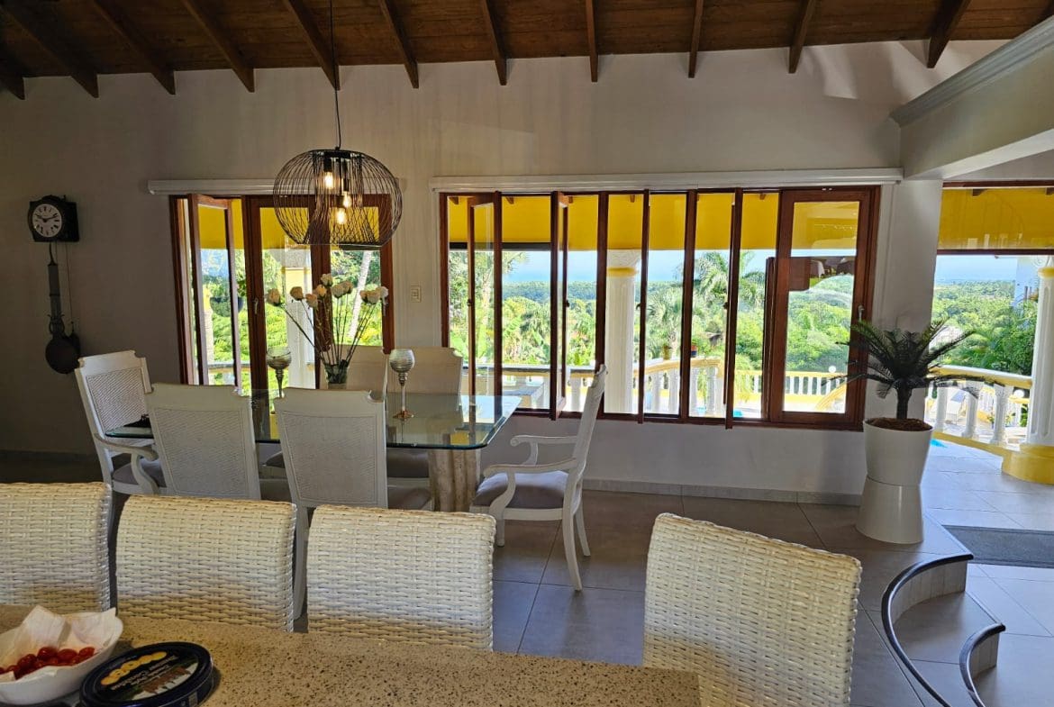 buyDRproperty Dining area with ocean views from a luxury villa for sale. Sosua Real Estate