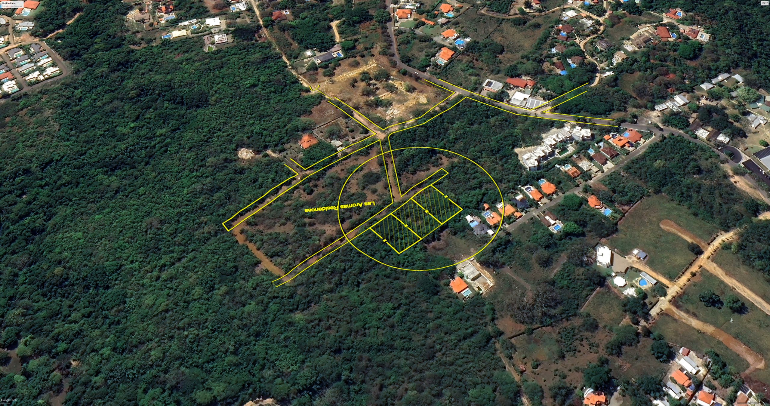 buyDRproperty Aerial view of building lots for sale in La Mulata, with planned roads and surrounding trees. Sosua Real Estate