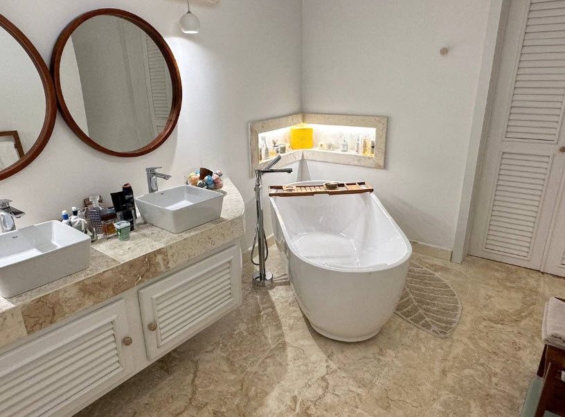 buyDRproperty Luxury bathroom with a freestanding tub in an ocean view villa for sale in Cabrera. Sosua Real Estate