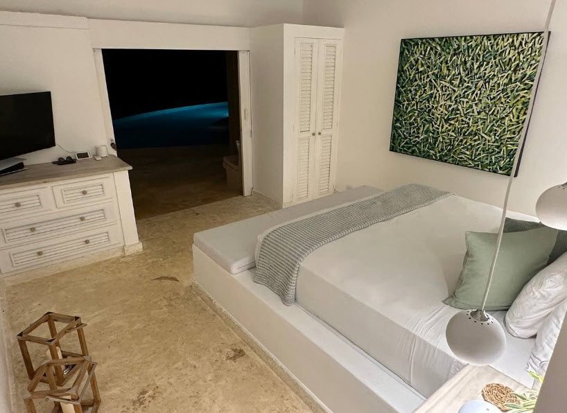 buyDRproperty Bedroom with ocean view access in a Dominican Republic villa. A beautiful Ocean View Villa for Sale. Sosua Real Estate