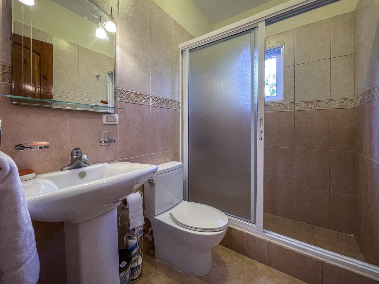 buyDRproperty Bathroom with sink, toilet, and shower in a 3BR Ocean View Home in Hispaniola. Sosua Real Estate