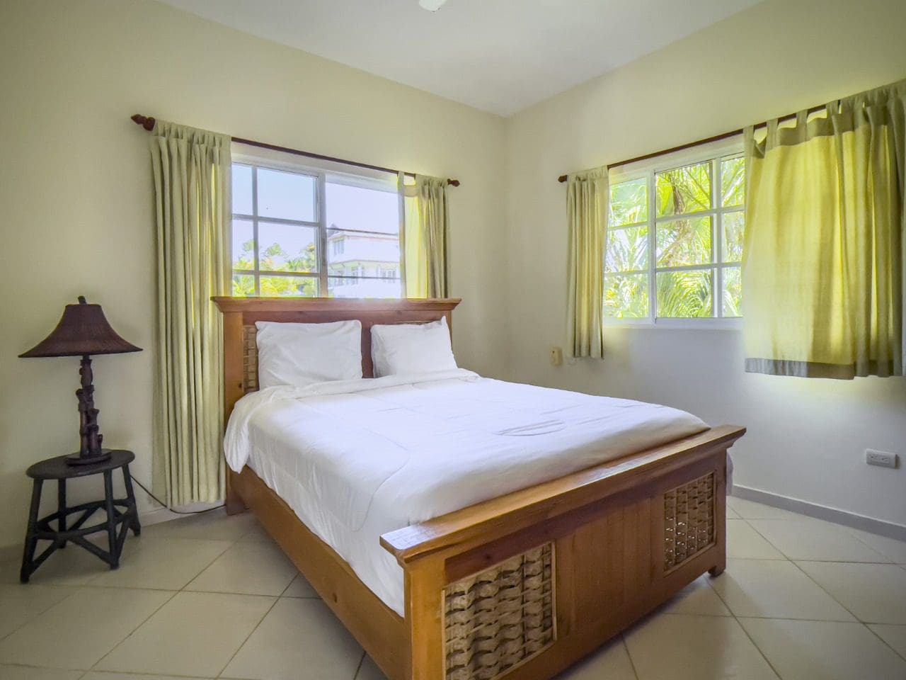 buyDRproperty Bedroom with a large bed in a 3BR Ocean View Home, Hispaniola Sosua Real Estate