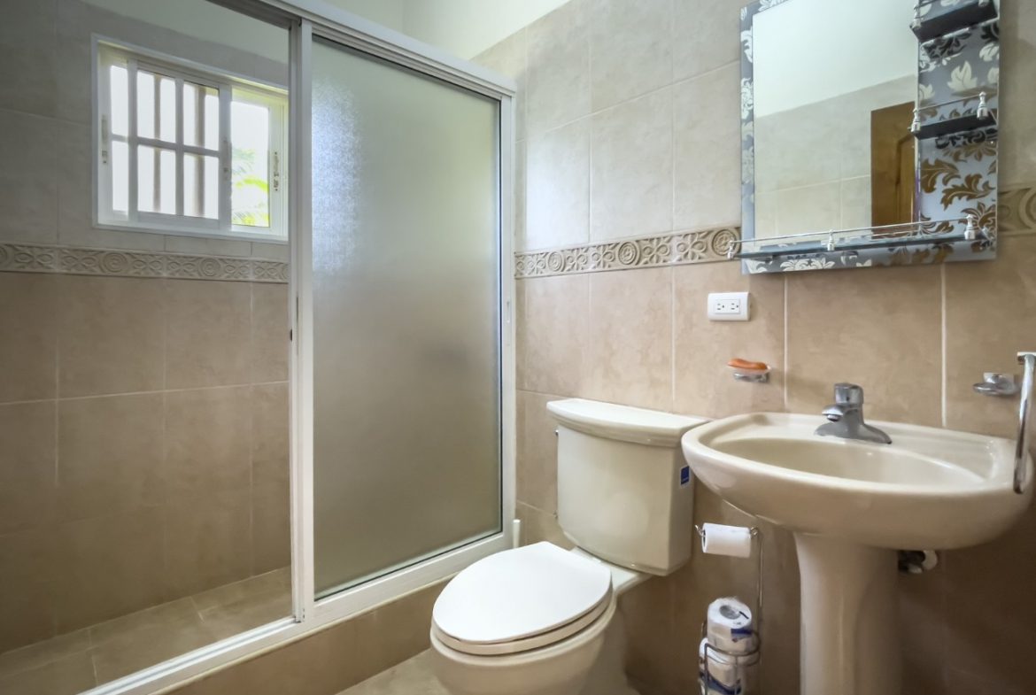 buyDRproperty Bathroom with shower, toilet, and sink in 3BR Ocean View Home, Hispaniola. Sosua Real Estate