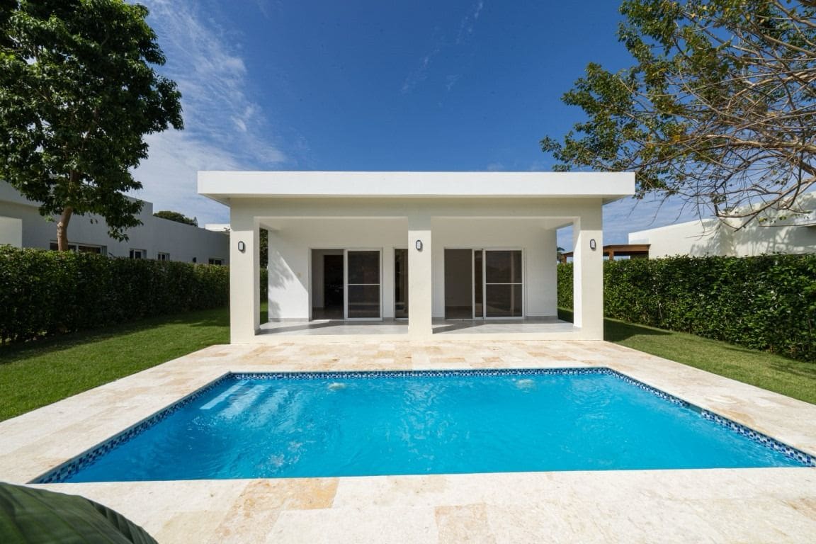 buyDRproperty Home for Sale in Sosua with pool and covered patio, blue sky Sosua Real Estate