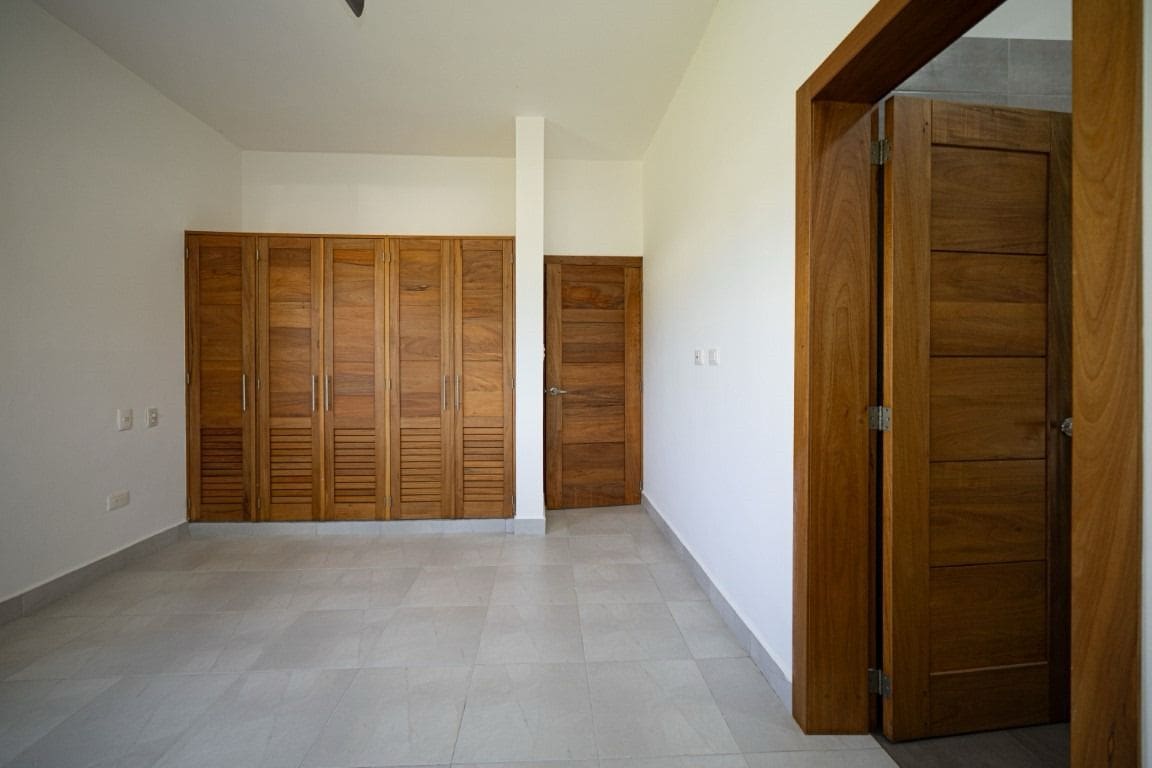buyDRproperty Wooden doors and closet in a home for sale. Sosua Real Estate
