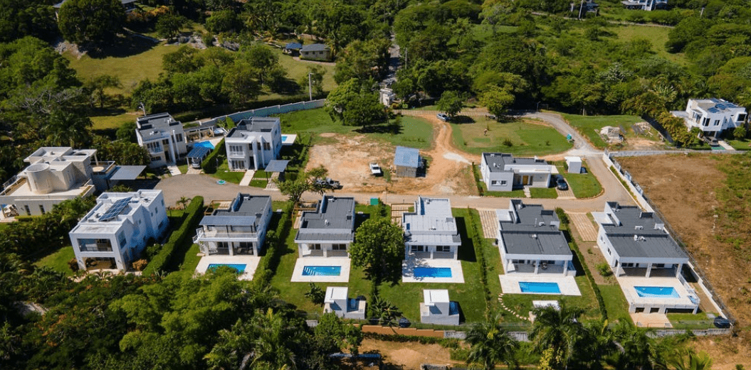 buyDRproperty Modern home for sale in Sosua gated community with pool Sosua Real Estate
