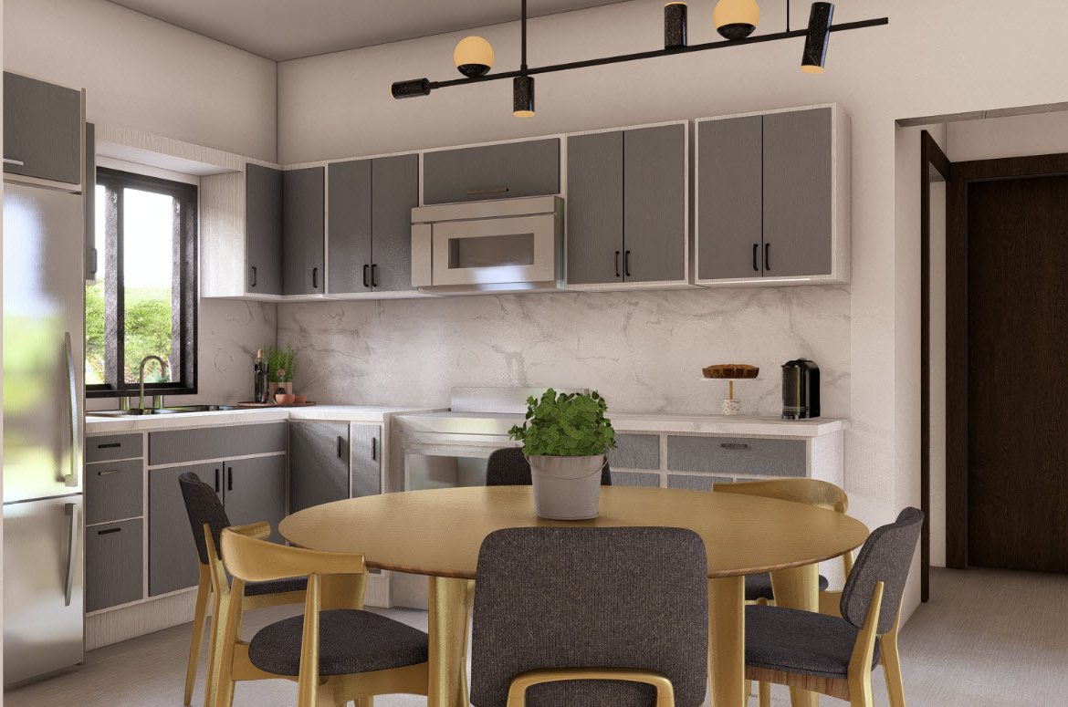 buyDRproperty Modern kitchen with gray cabinets and round dining table. The home is a Casa Linda Villa, Bliss. Sosua Real Estate