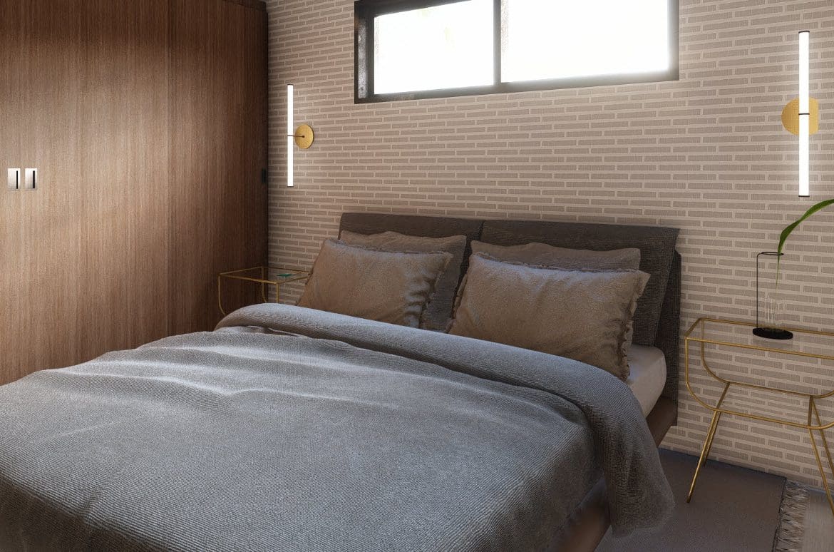 buyDRproperty Cozy bedroom with a gray bedspread and Bliss wall sconces. Sosua Real Estate