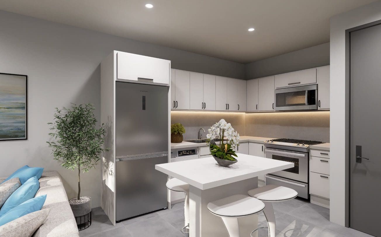 buyDRproperty Modern kitchen in a Casa Linda townhouse with white cabinets and island. Sosua Real Estate