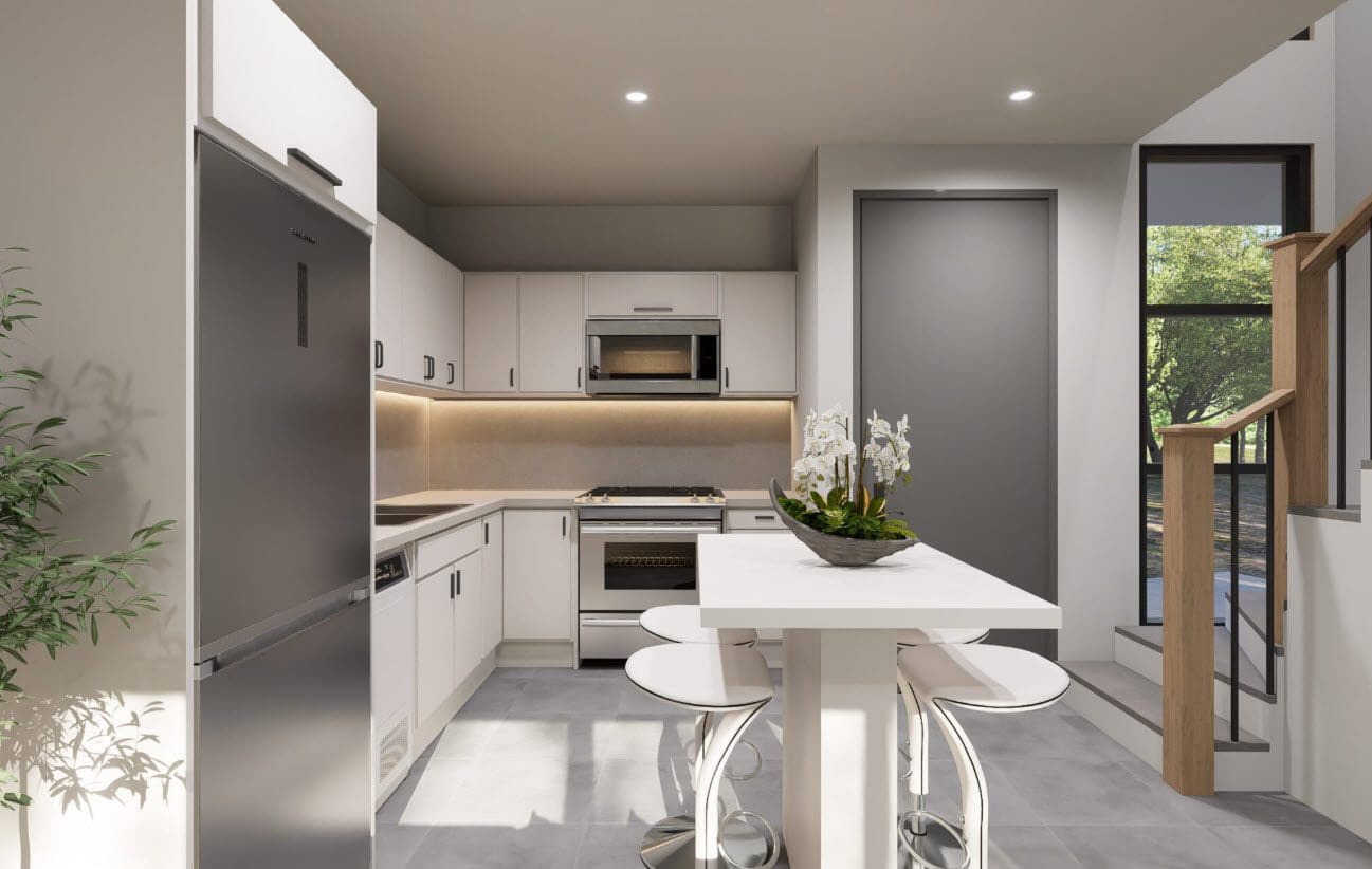 buyDRproperty Modern kitchen with white cabinets, stainless steel appliances, and a breakfast bar in a Casa Linda townhouse. Sosua Real Estate