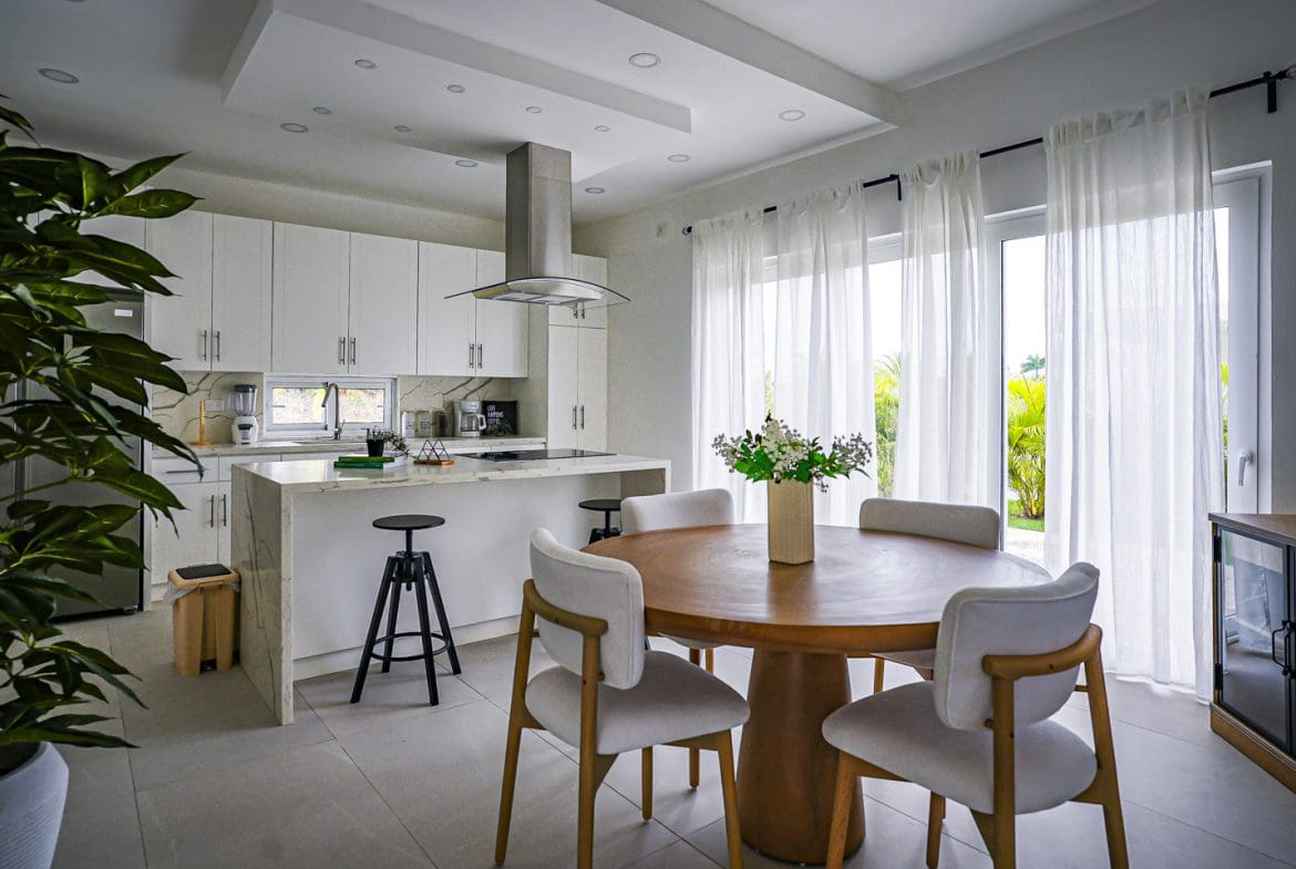 buyDRproperty Modern kitchen and dining area in a beautiful villa, Sosua Ocean Village. Sosua Real Estate