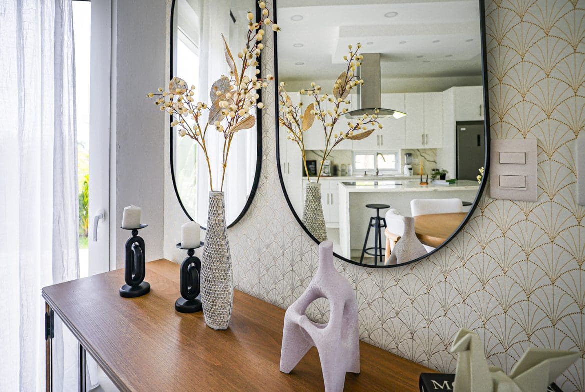 buyDRproperty Modern interior decor with vases, candles, and mirrors Sosua Real Estate