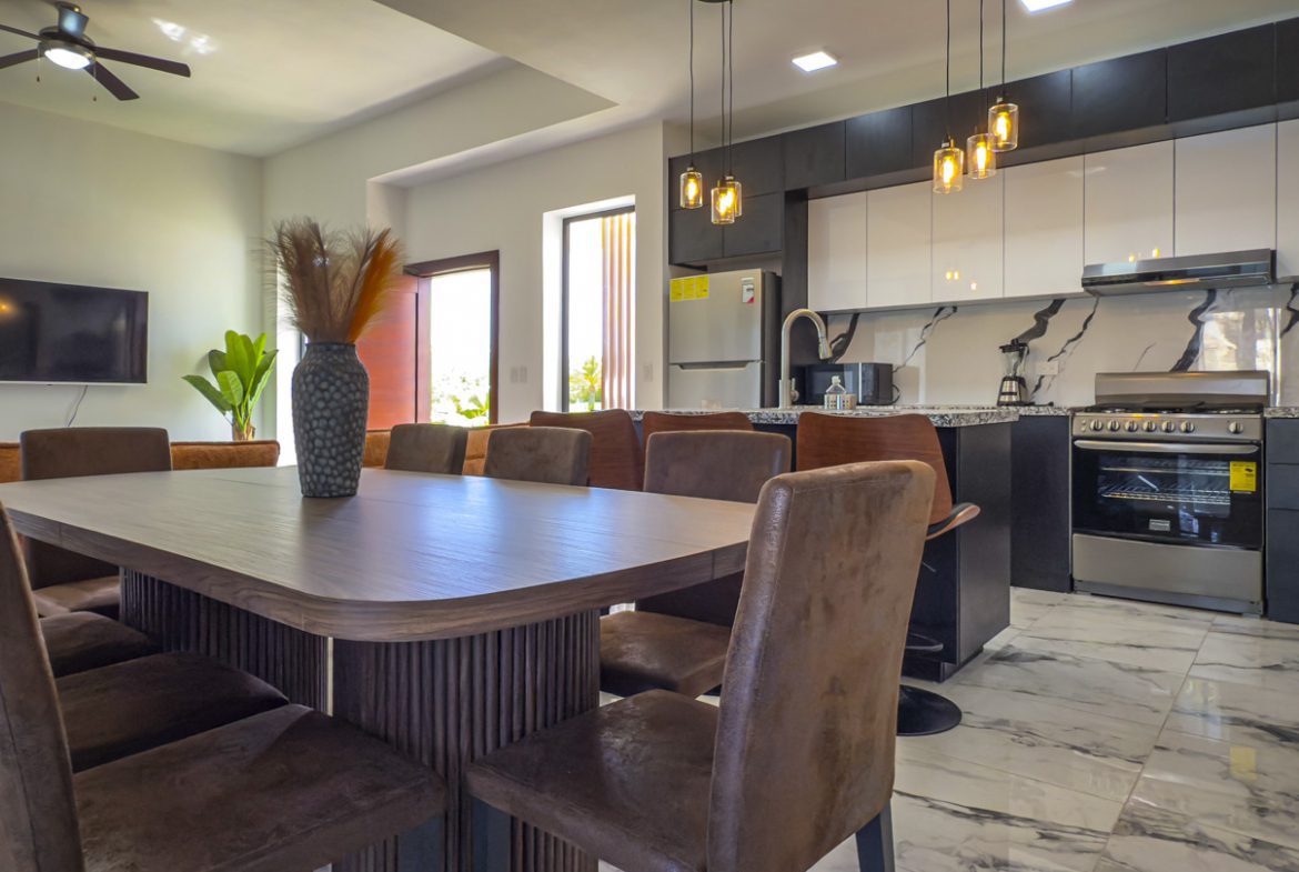 buyDRproperty Modern dining room with kitchen in a 3BR villa, Sosua Ocean Village Sosua Real Estate