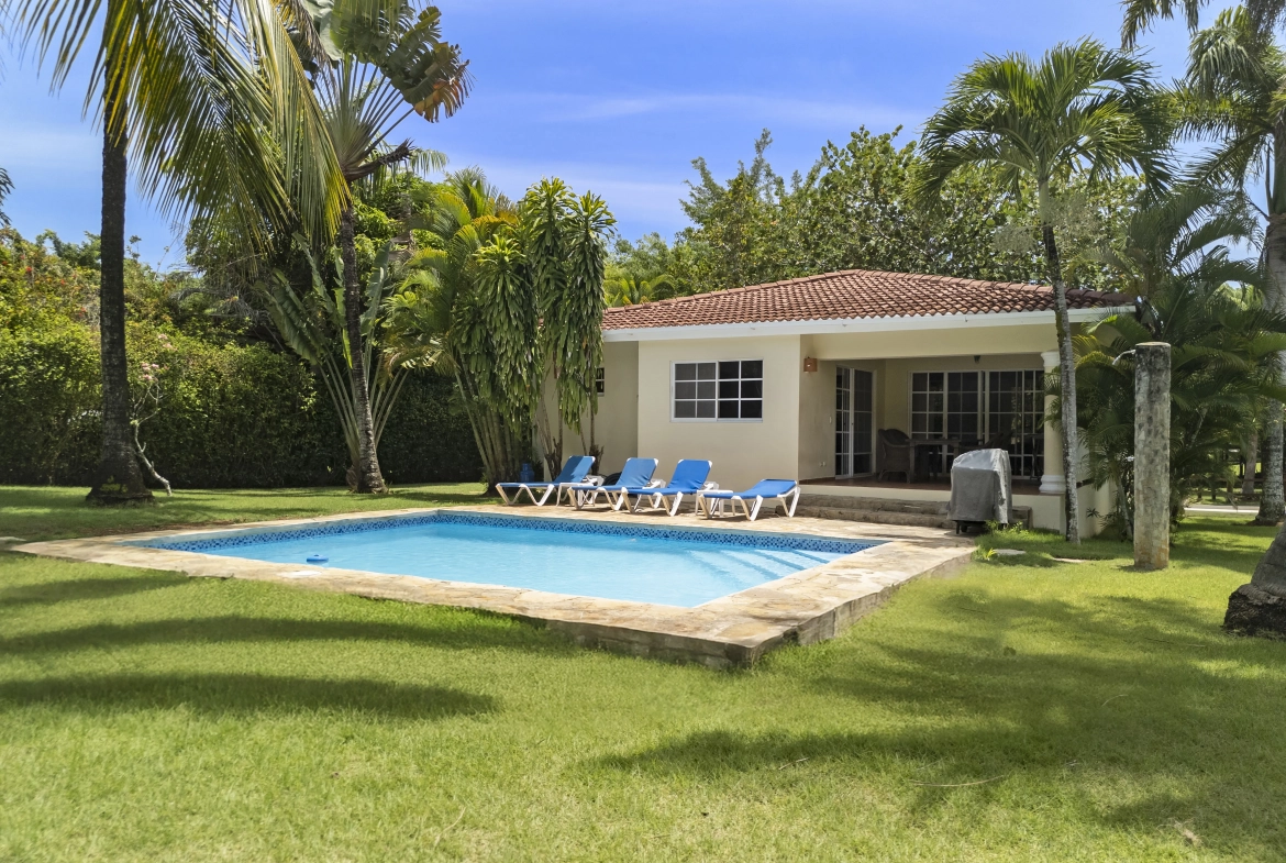 buyDRproperty Villa for sale in Sosua, Dominican Republic, with pool and palm trees. Sosua Real Estate