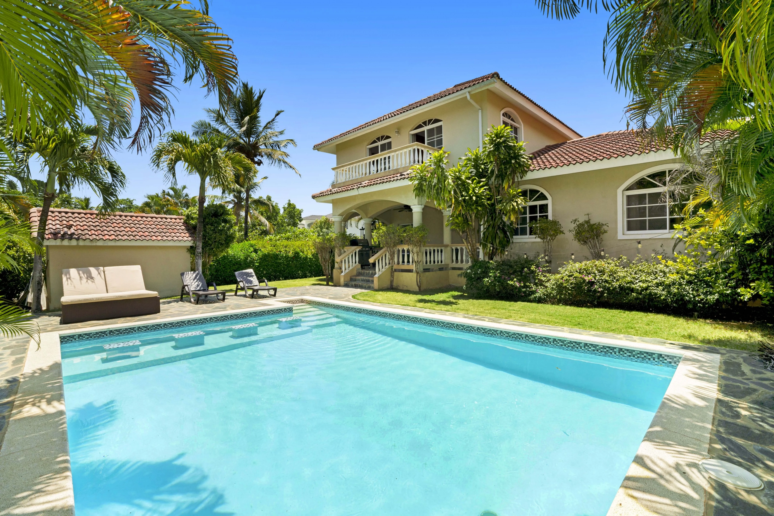 Aerial view of 2-story villa with private pool in Residencial Hispaniola Sosúa