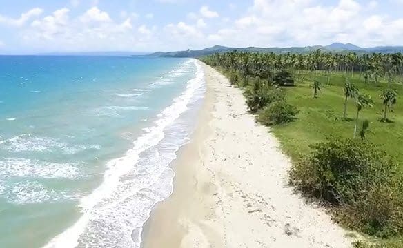 buyDRproperty Aerial view of beachfront land near Cabarete, Dominican Republic. Sosua Real Estate