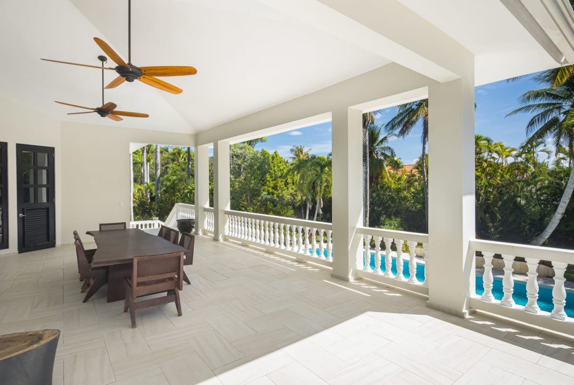 buyDRproperty Luxury outdoor patio with pool view in a tropical home Sosua Real Estate