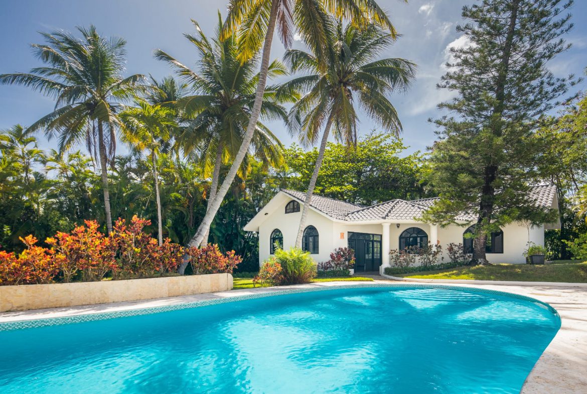 buyDRproperty Luxury vacation rental villa with pool and palm trees Sosua Real Estate