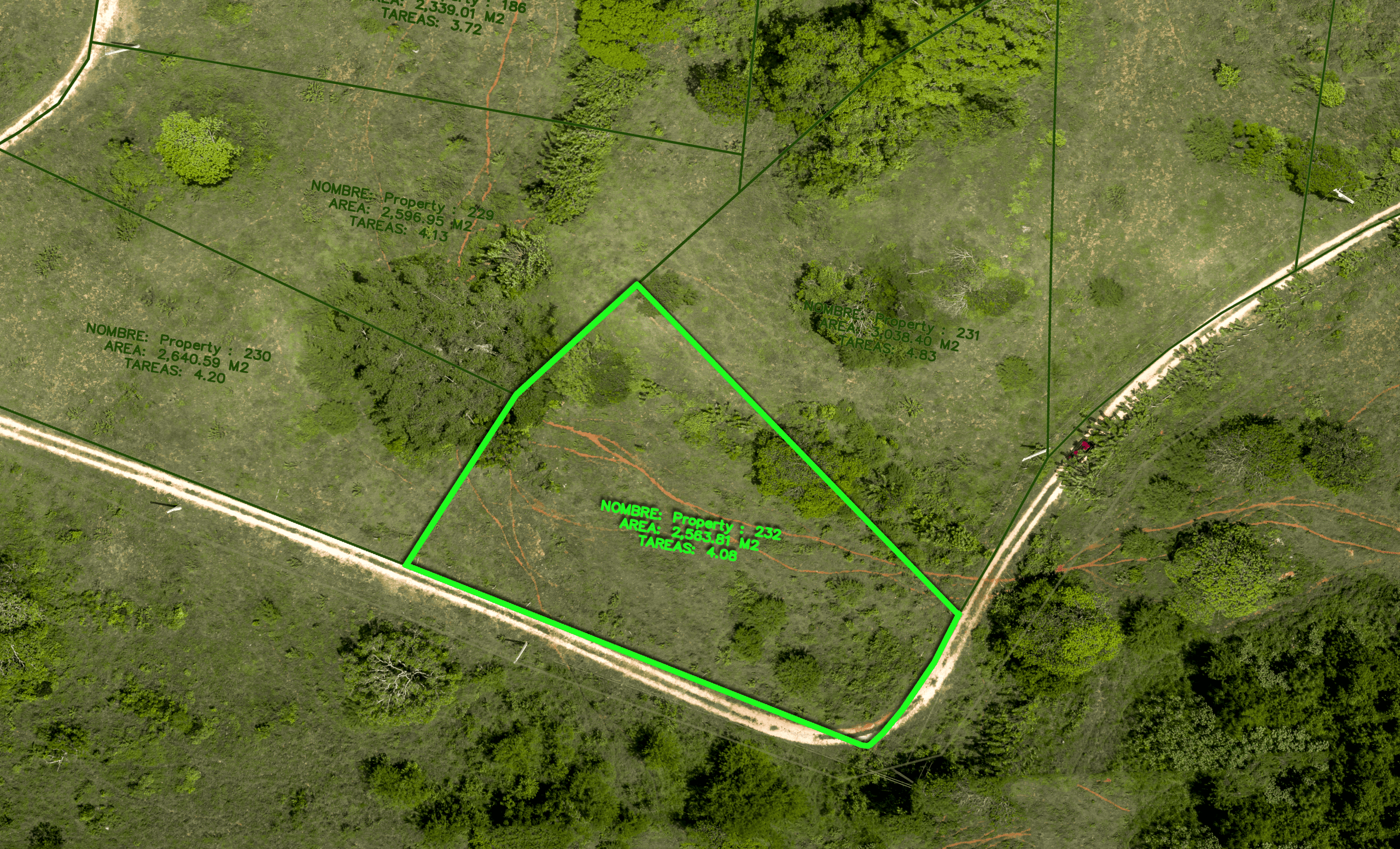 buyDRproperty Aerial view of a green-outlined land plot with surrounding trees and paths Sosua Real Estate