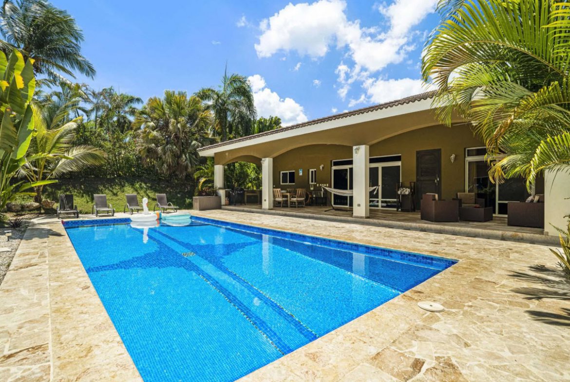 buyDRproperty Elegant villa with swimming pool and tropical landscaping in Sosúa. Sosua Real Estate