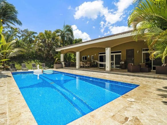 buyDRproperty Elegant villa with swimming pool and tropical landscaping in Sosúa. Sosua Real Estate