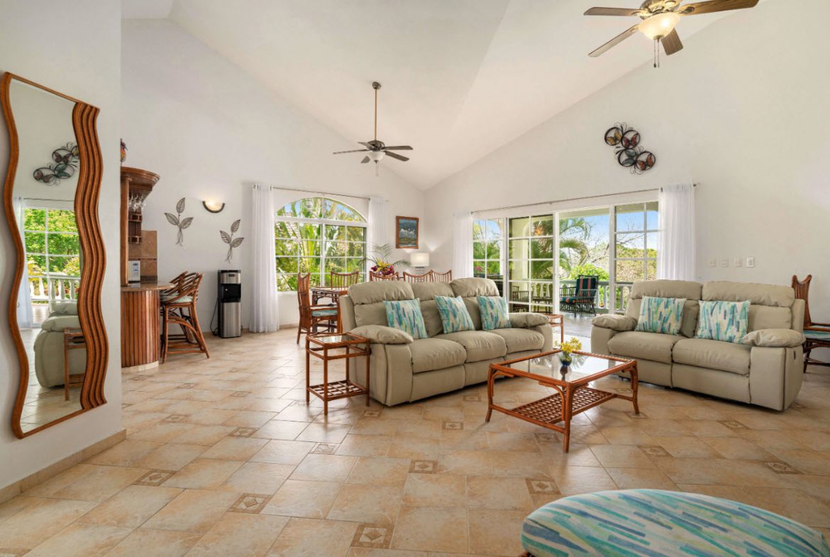 buyDRproperty Living room with ocean view in Residential Hispaniola villa for sale. Sosua Real Estate