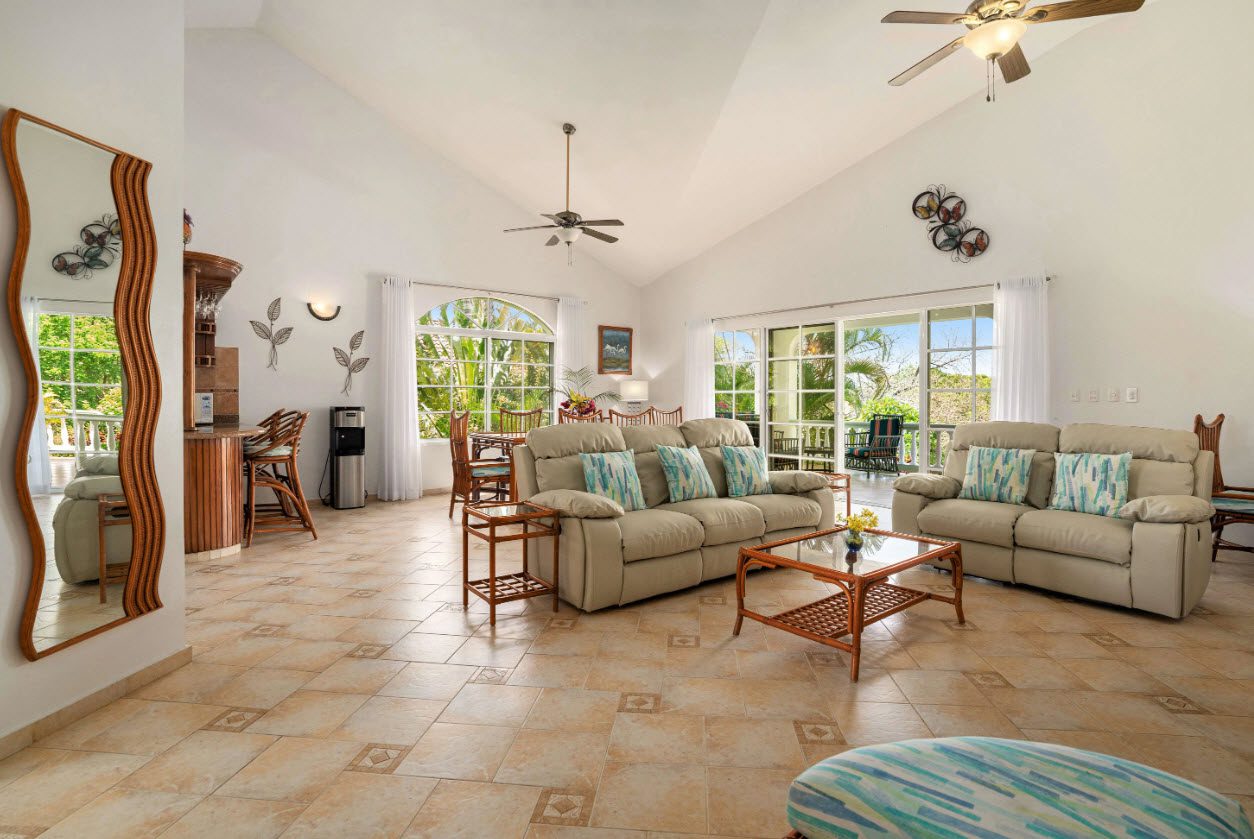 buyDRproperty Living room with ocean view in Residential Hispaniola villa for sale. Sosua Real Estate