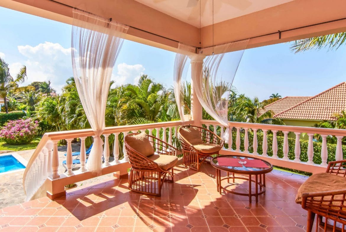buyDRproperty Balcony of a villa for sale in Residential Hispaniola with seating and a view. Sosua Real Estate