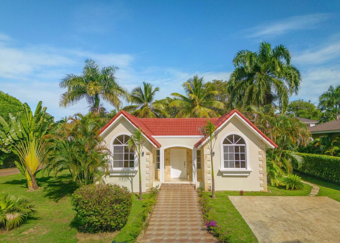 buyDRproperty Beautiful 3 BR Villa with red tile roof and lush landscaping in Sosúa. Sosua Real Estate