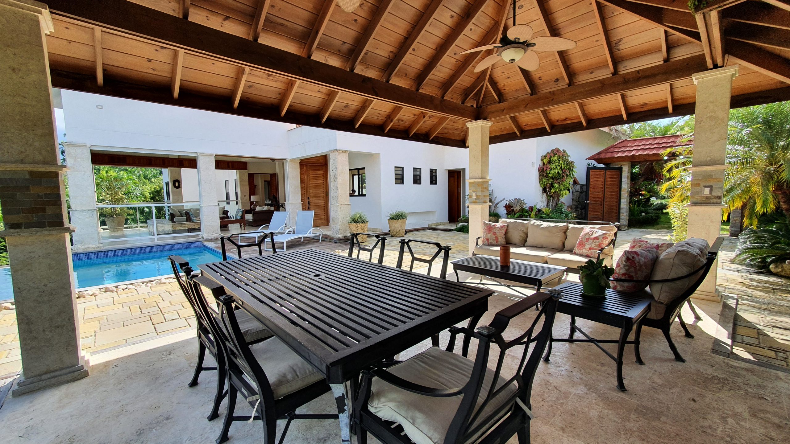 buyDRproperty Luxury outdoor patio with pool and gazebo, perfect for luxury home living Sosua Real Estate