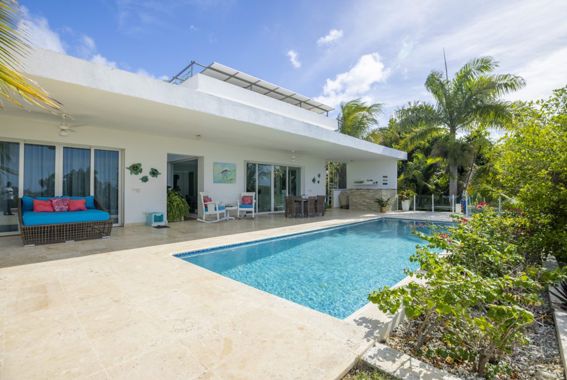 buyDRproperty Luxury Caribbean villa with private pool and outdoor seating area Sosua Real Estate