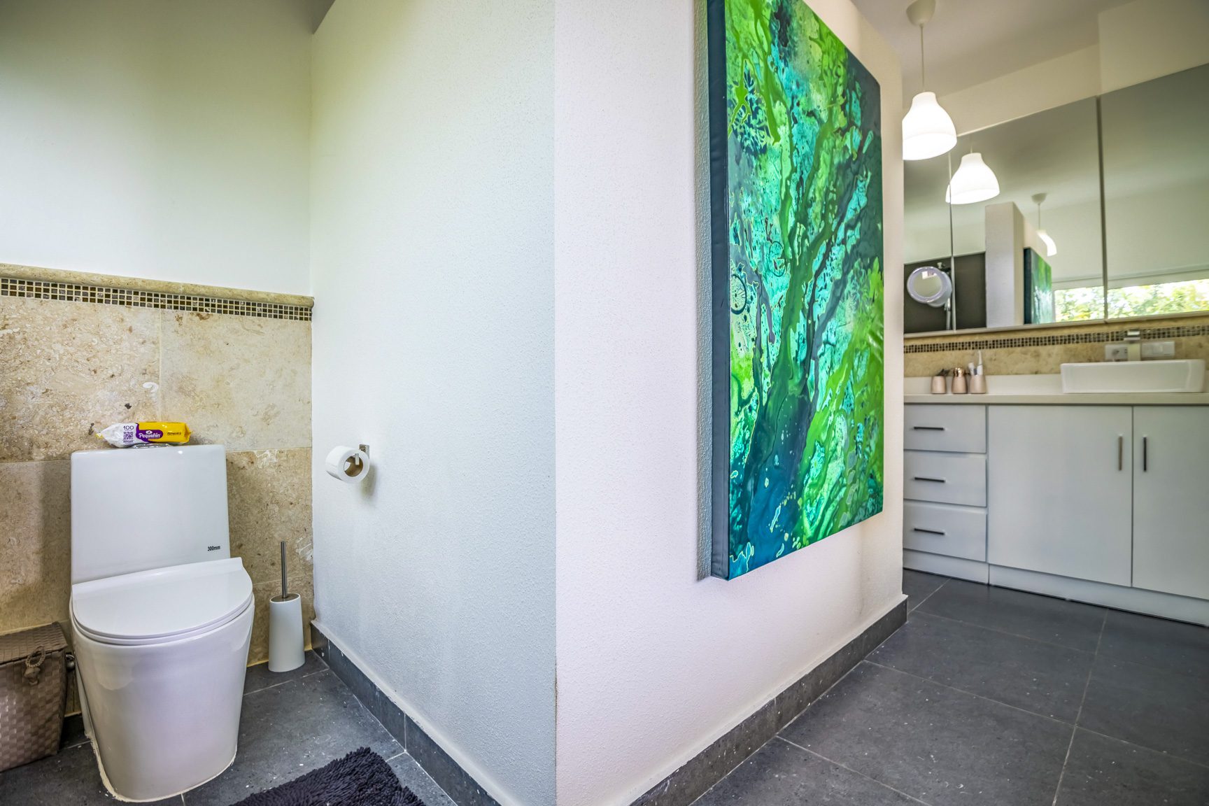 buyDRproperty Sunlight streaming through a window, illuminating a plant. Sosua Real Estate