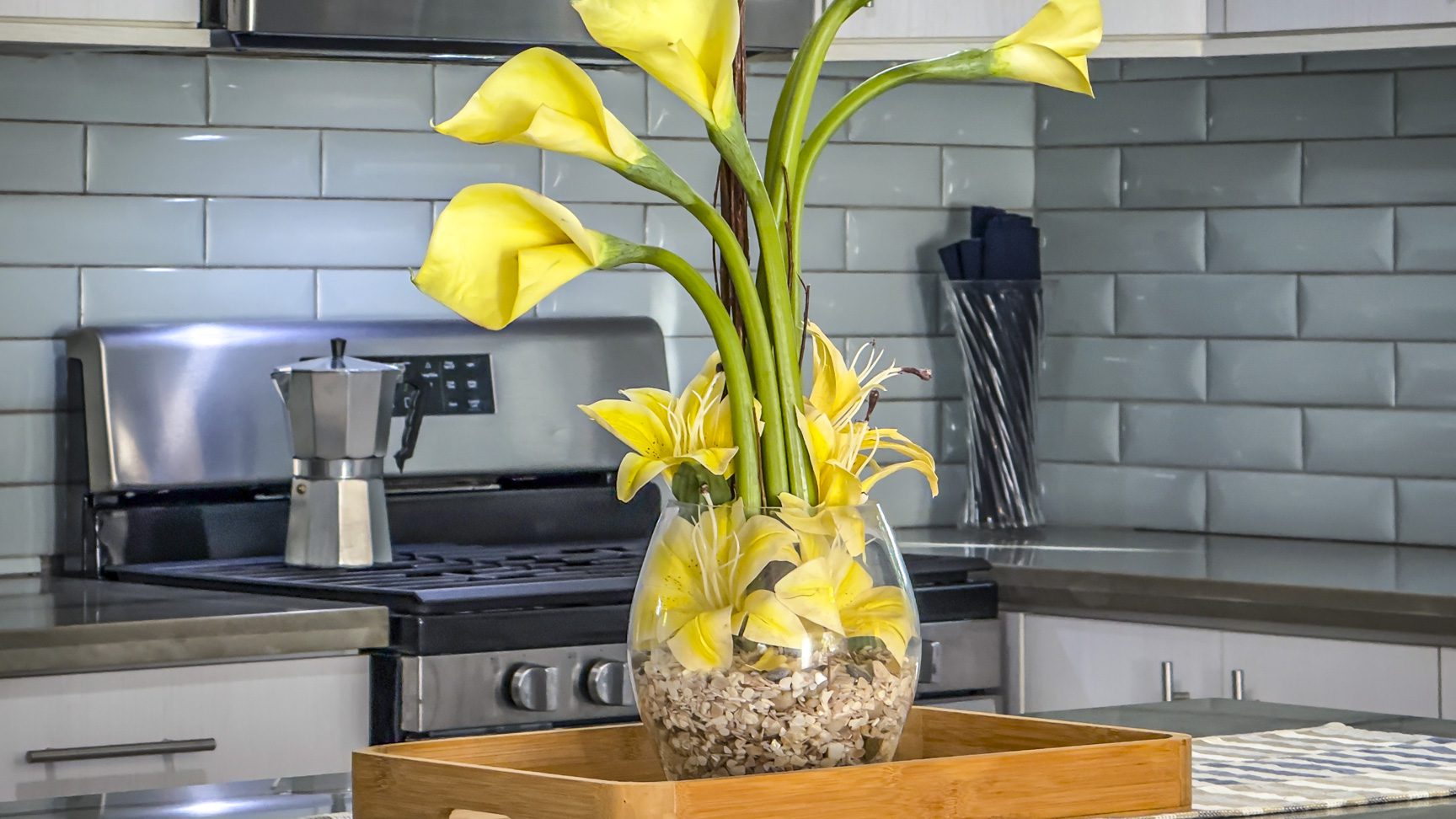buyDRproperty Yellow calla lilies in a modern kitchen, a fresh kitchen decor idea. Sosua Real Estate