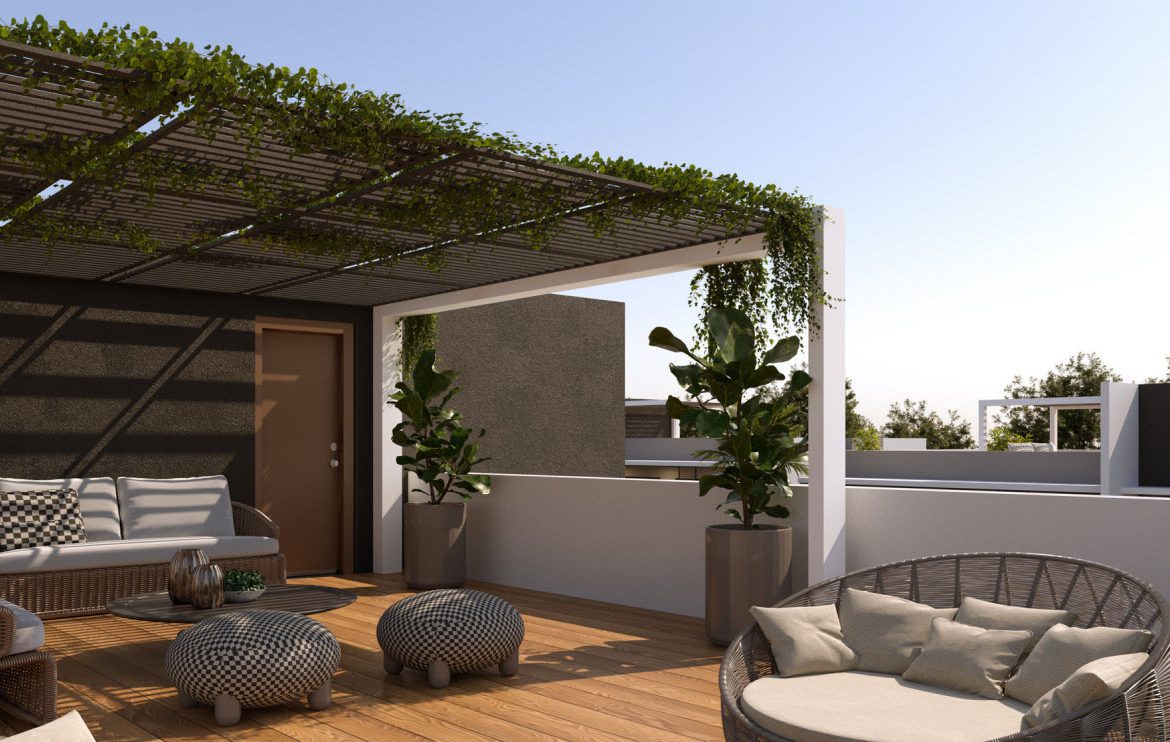 buyDRproperty Outdoor patio with wicker furniture, pergola, and potted plants. Relaxing rooftop terrace design. Sosua Real Estate