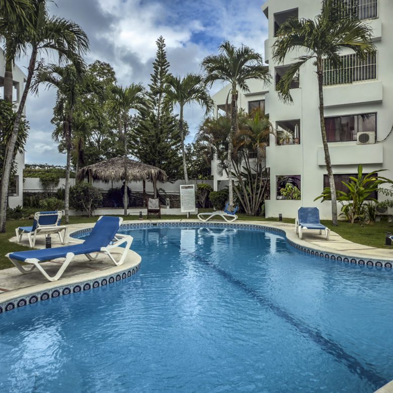 Buydrproperty Sosúa Condo Complex Pool with Lounge Chairs Great Value Playa Property Sosua Real Estate Buydrpropertycom Buydrpropertycom