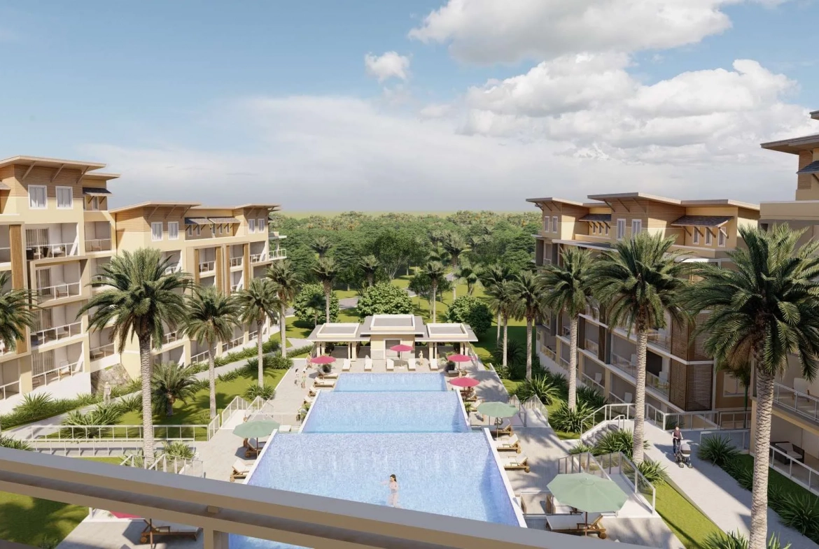 buyDRproperty Luxury resort with pools, palm trees, and modern condo buildings. Sosua Real Estate