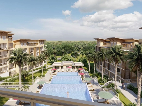 buyDRproperty Luxury resort with pools, palm trees, and modern condo buildings. Sosua Real Estate