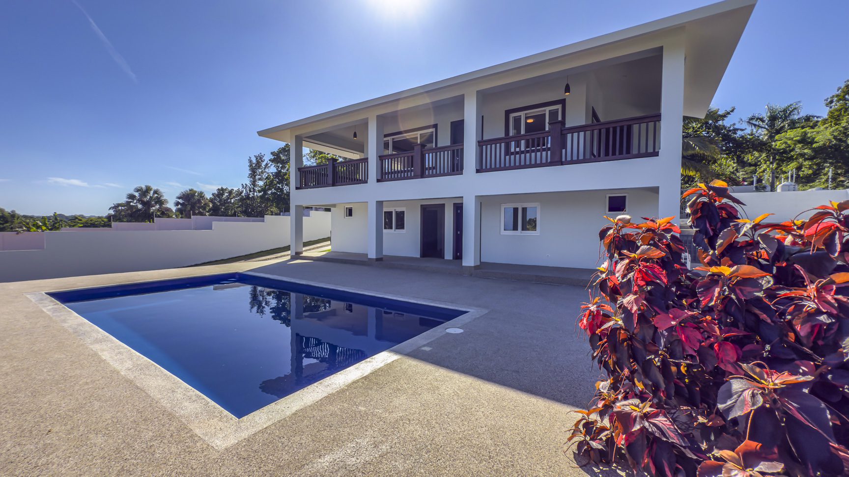 buyDRproperty La Mulata villa with a pool for sale. Modern 3-bedroom home exterior view. Sosua Real Estate