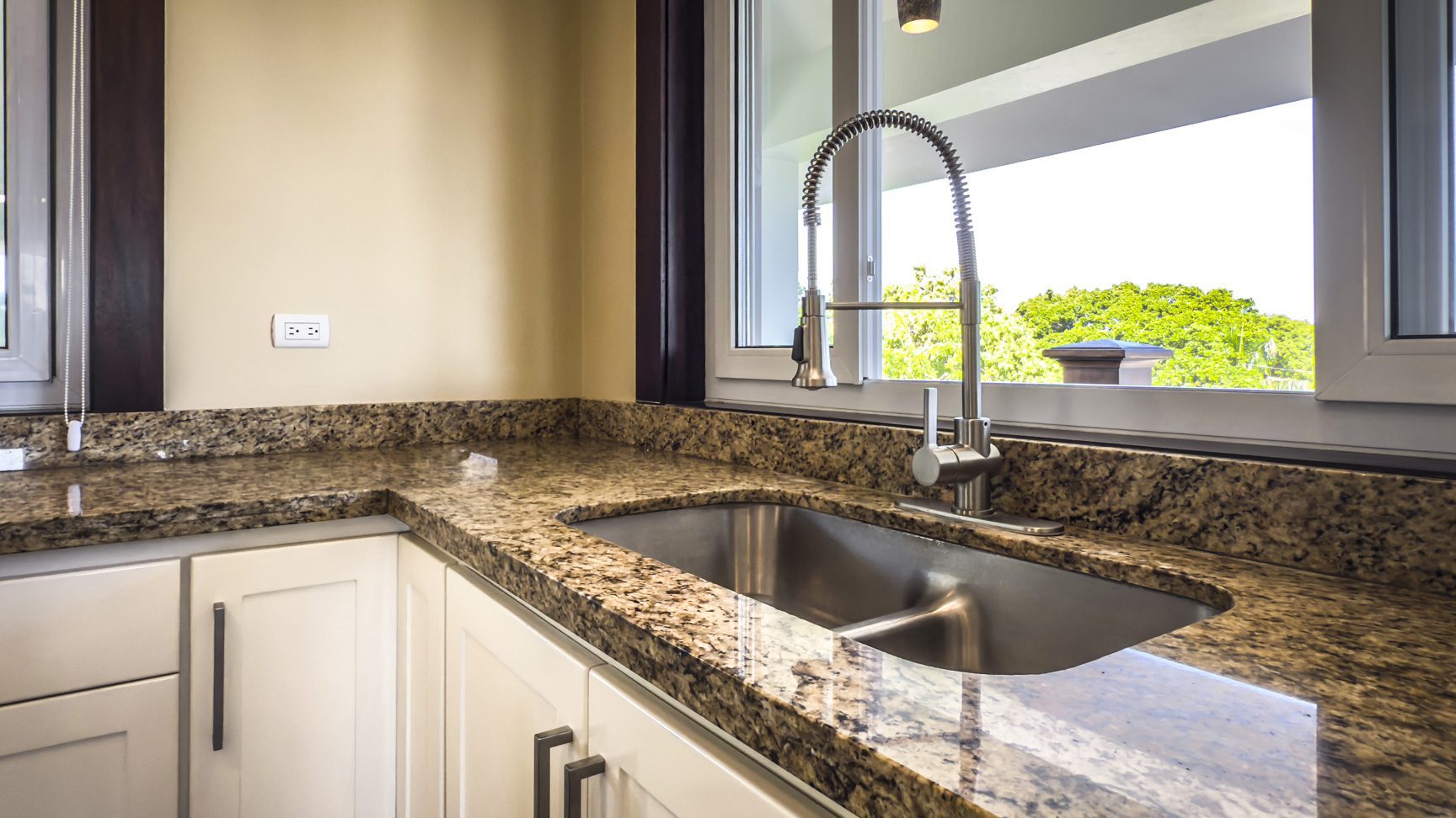 buyDRproperty Kitchen sink with granite countertops in a La Mulata 3-bedroom villa for sale. Sosua Real Estate