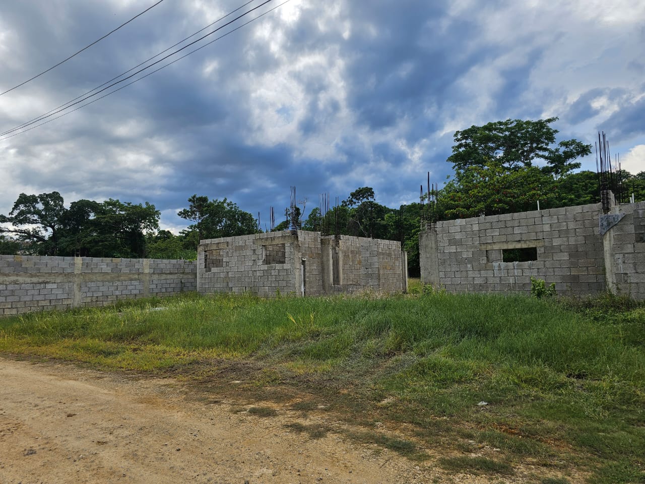 buyDRproperty Unfinished concrete block construction on a 993 m² lot, suitable for development near Casa Linda. Sosua Real Estate