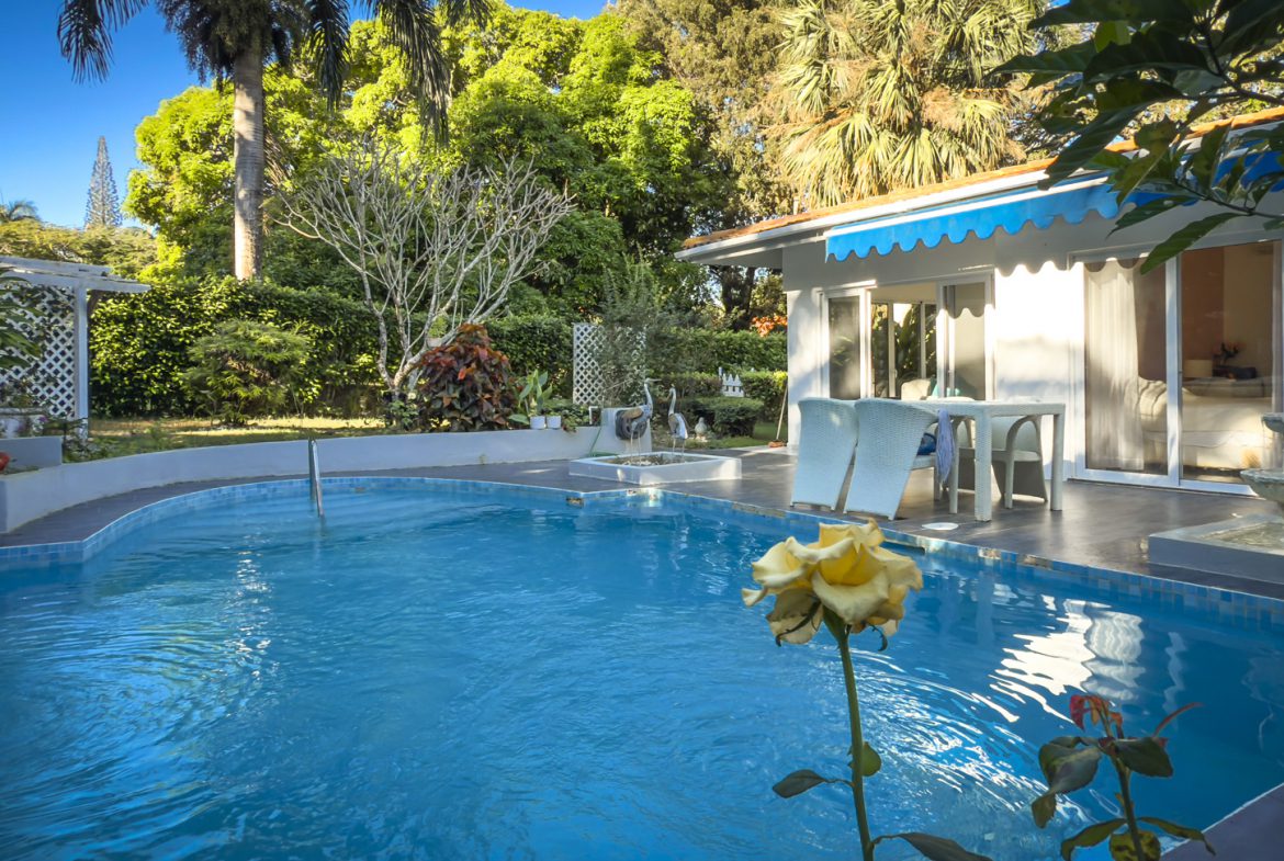 buyDRproperty Colibri villa with private pool and garden. Tropical oasis with waterfall feature. Sosua Real Estate