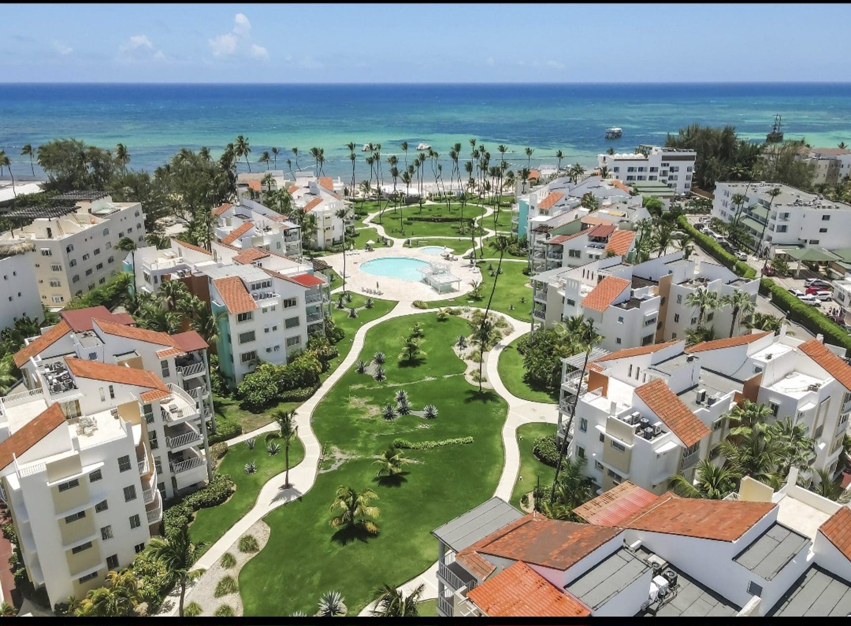 buyDRproperty Aerial view of Punta Cana all-inclusive family resorts near the beach in Dominican Republic. Sosua Real Estate