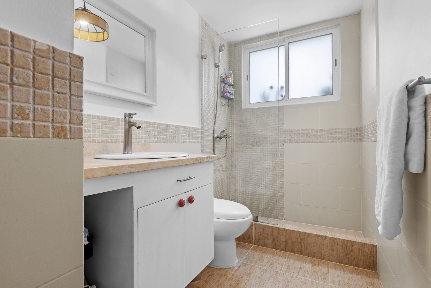 buyDRproperty Modern bathroom with white vanity, sink, and walk-in shower Sosua Real Estate