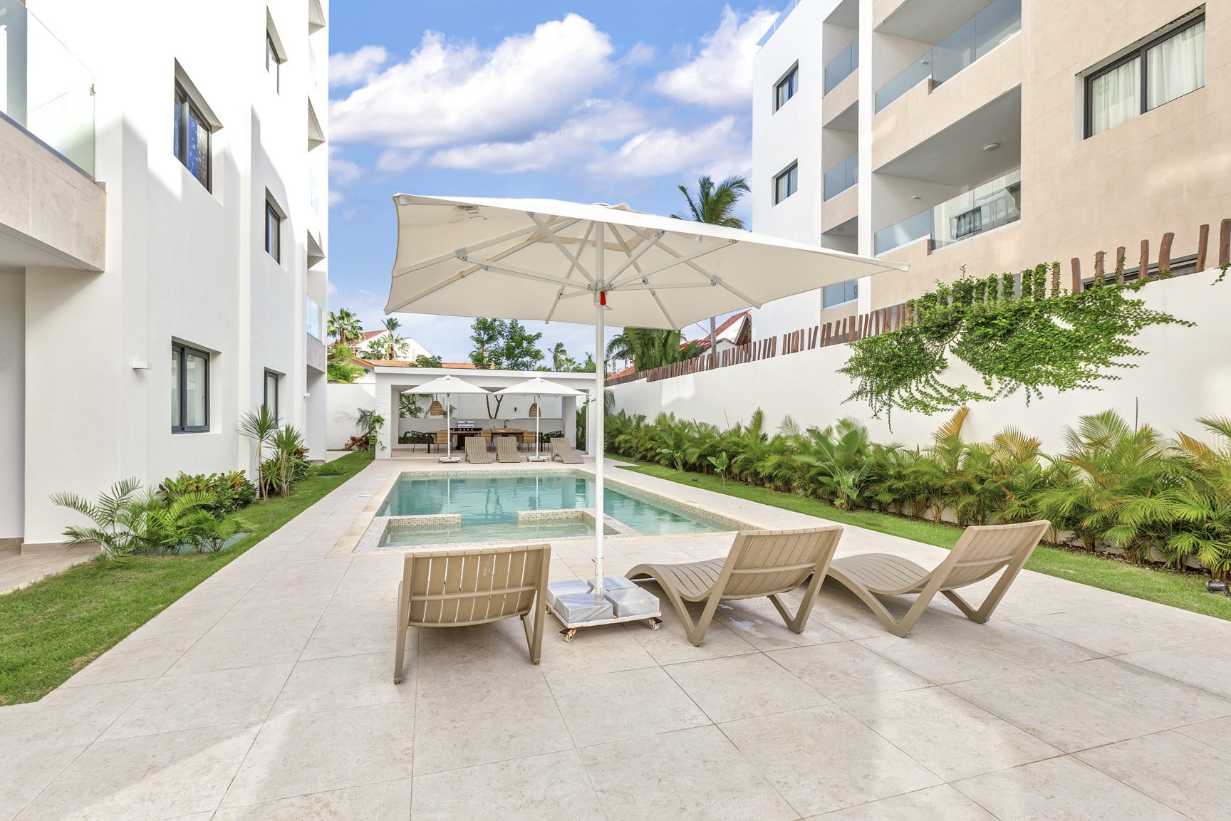 buyDRproperty Eco-friendly green cleaning products on a wooden table in a sustainable home. Sosua Real Estate