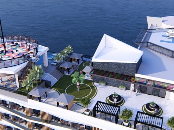 buyDRproperty Dominican Republic flag flies over a luxury resort with a helipad and rooftop pool. Sosua Real Estate